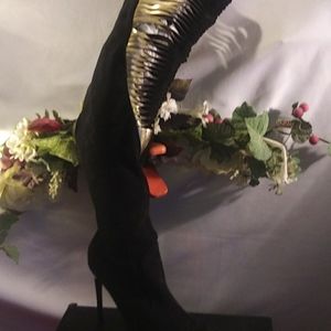 Desire boots sexy over the knee.